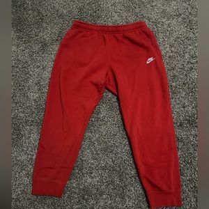 Red Nike sweat pants